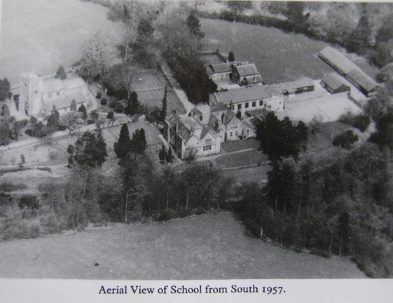 0980, BG 032, 1 Sep 1957, Aerial view of School and Church from South