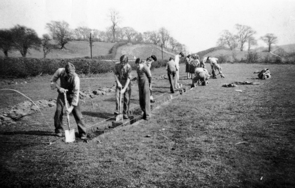 0105.21, JW 059, 16 Sep 1950, Digging trenches on the sports field